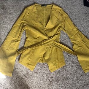 Mustard yellow cross tie front long sleeve bell bottom top